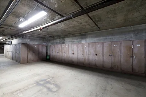 an aerial view of a residential apartment building with a yard