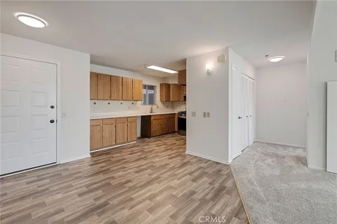 a view of kitchen with wooden floor