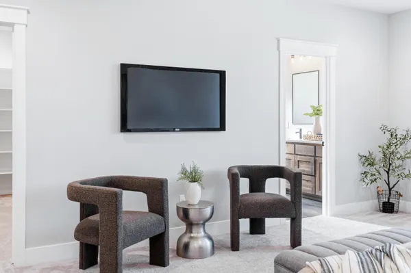 a bathroom with double vanity sinks and a mirror