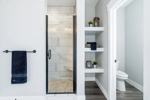 a bathroom with a sink a toilet and bathtub
