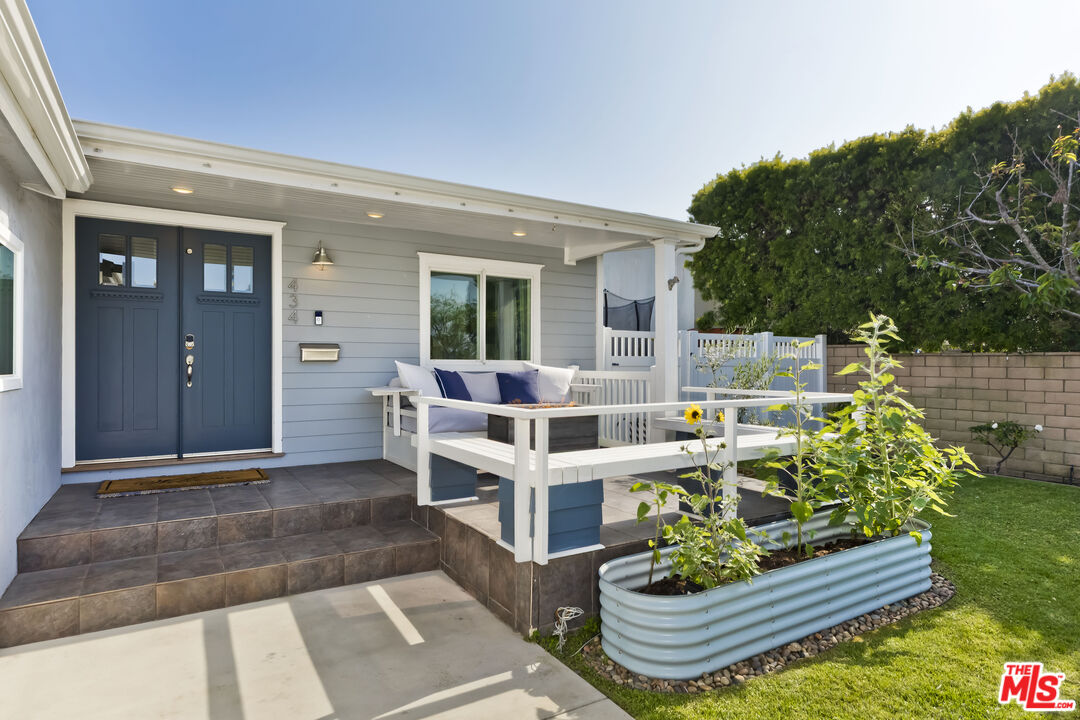 434 West Maple Avenue El Segundo, CA 90245 - Photo 5 of 29 a view of a porch with furniture and garden