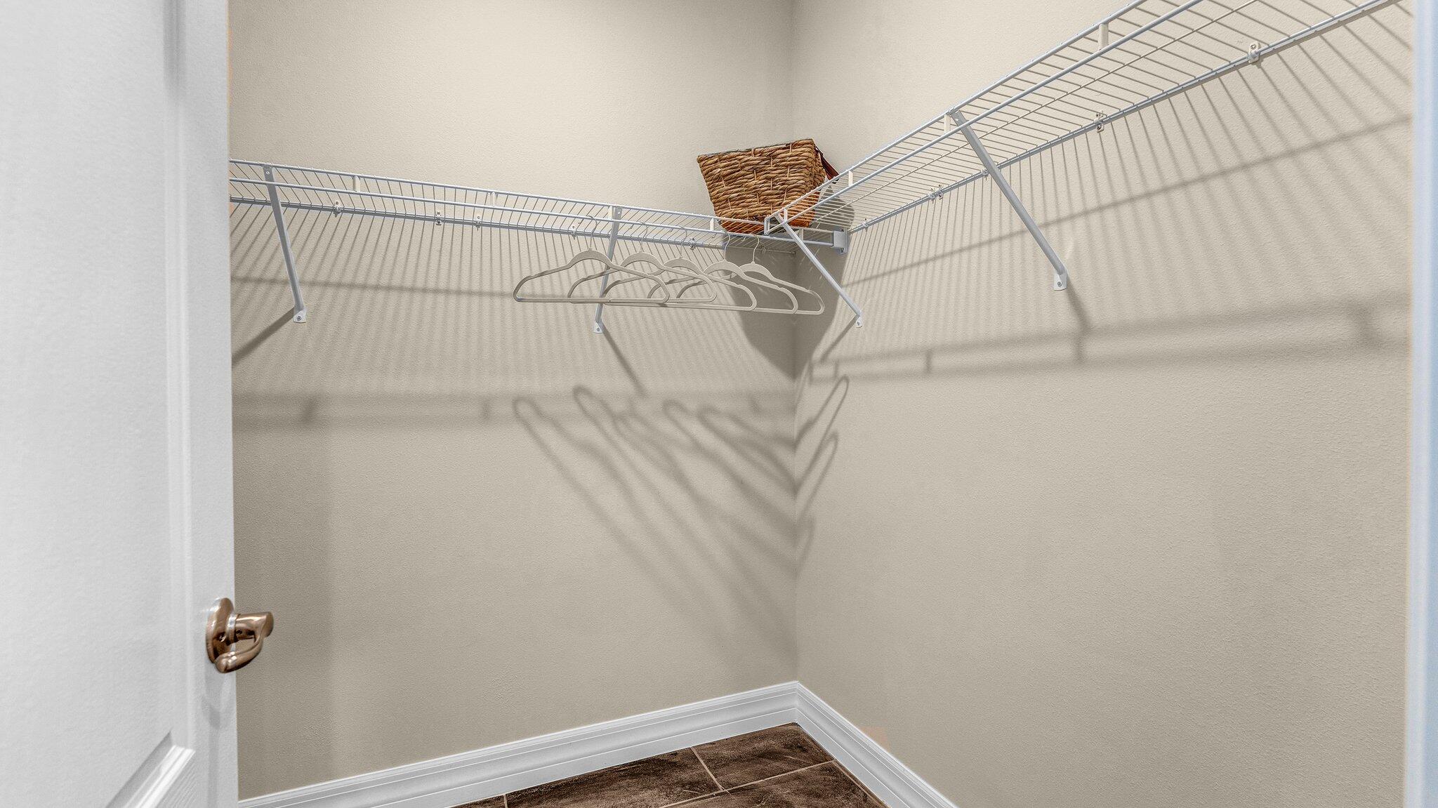 933 Tupelo Road Southwest Palm Bay, FL 32908 - Photo 20 of 31 a view of a room with racks on the wall