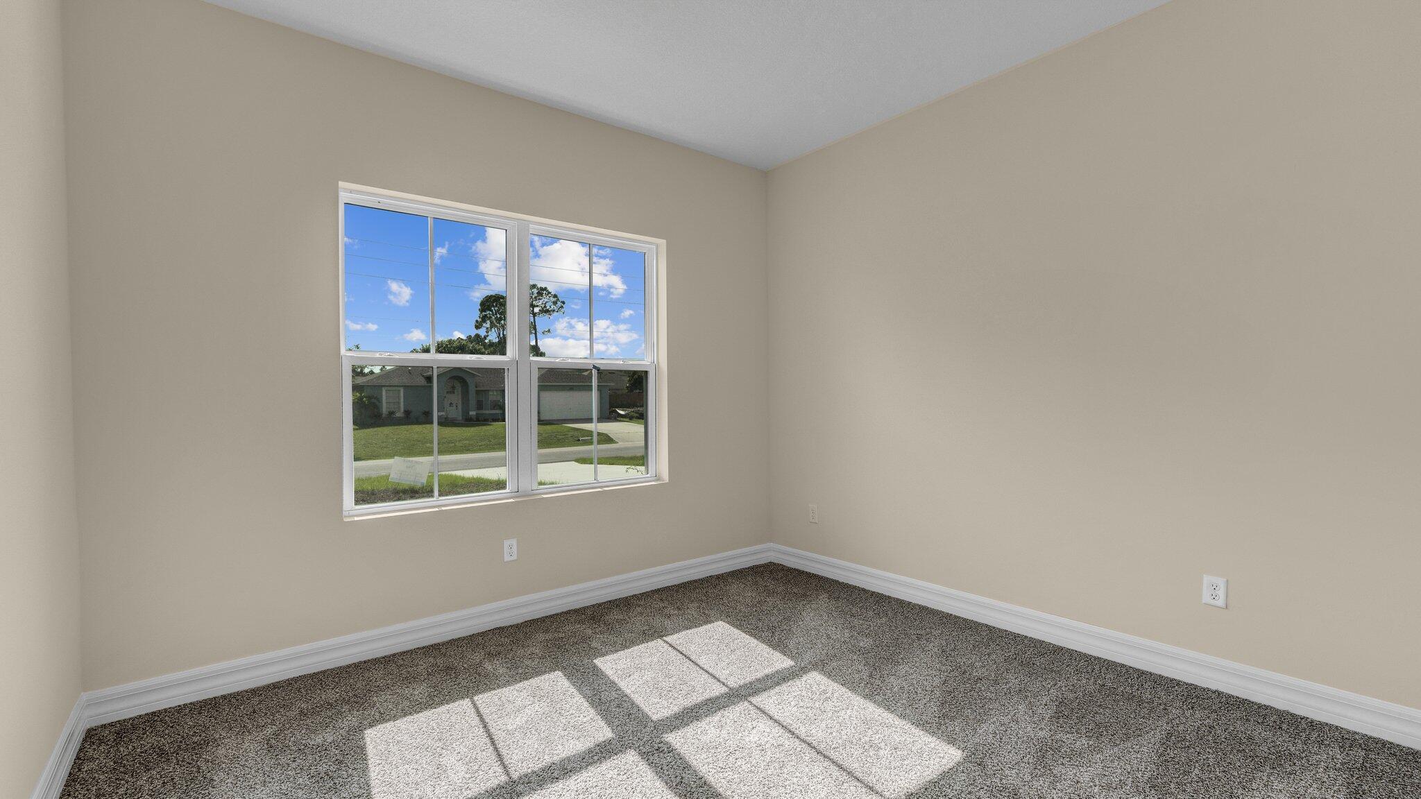 933 Tupelo Road Southwest Palm Bay, FL 32908 - Photo 24 of 31 an empty room with a window