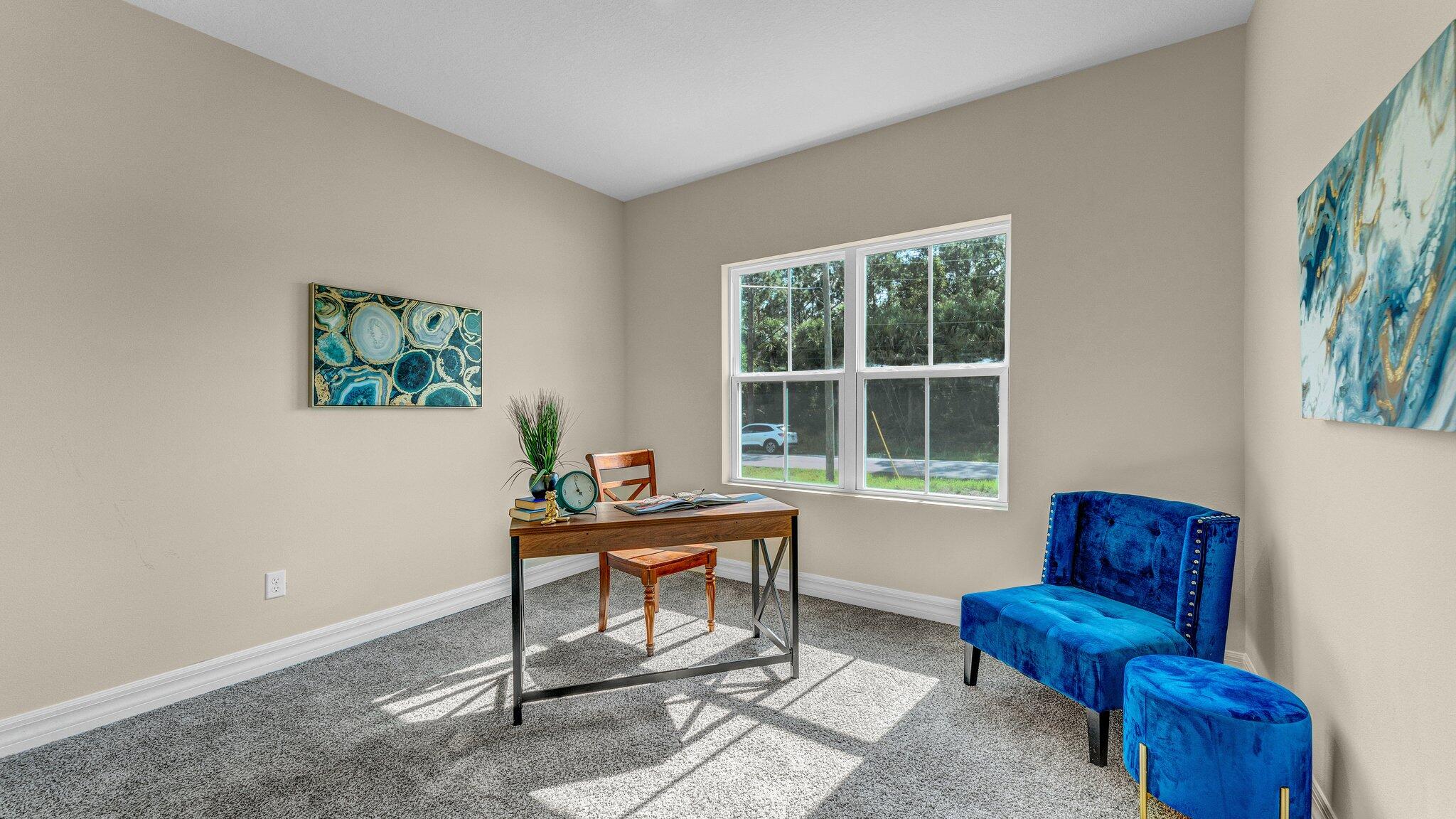 933 Tupelo Road Southwest Palm Bay, FL 32908 - Photo 25 of 31 a living room with furniture and a window