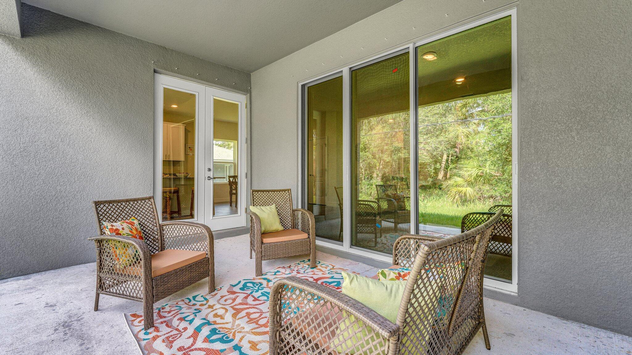 933 Tupelo Road Southwest Palm Bay, FL 32908 - Photo 27 of 31 a living room with furniture and a large window