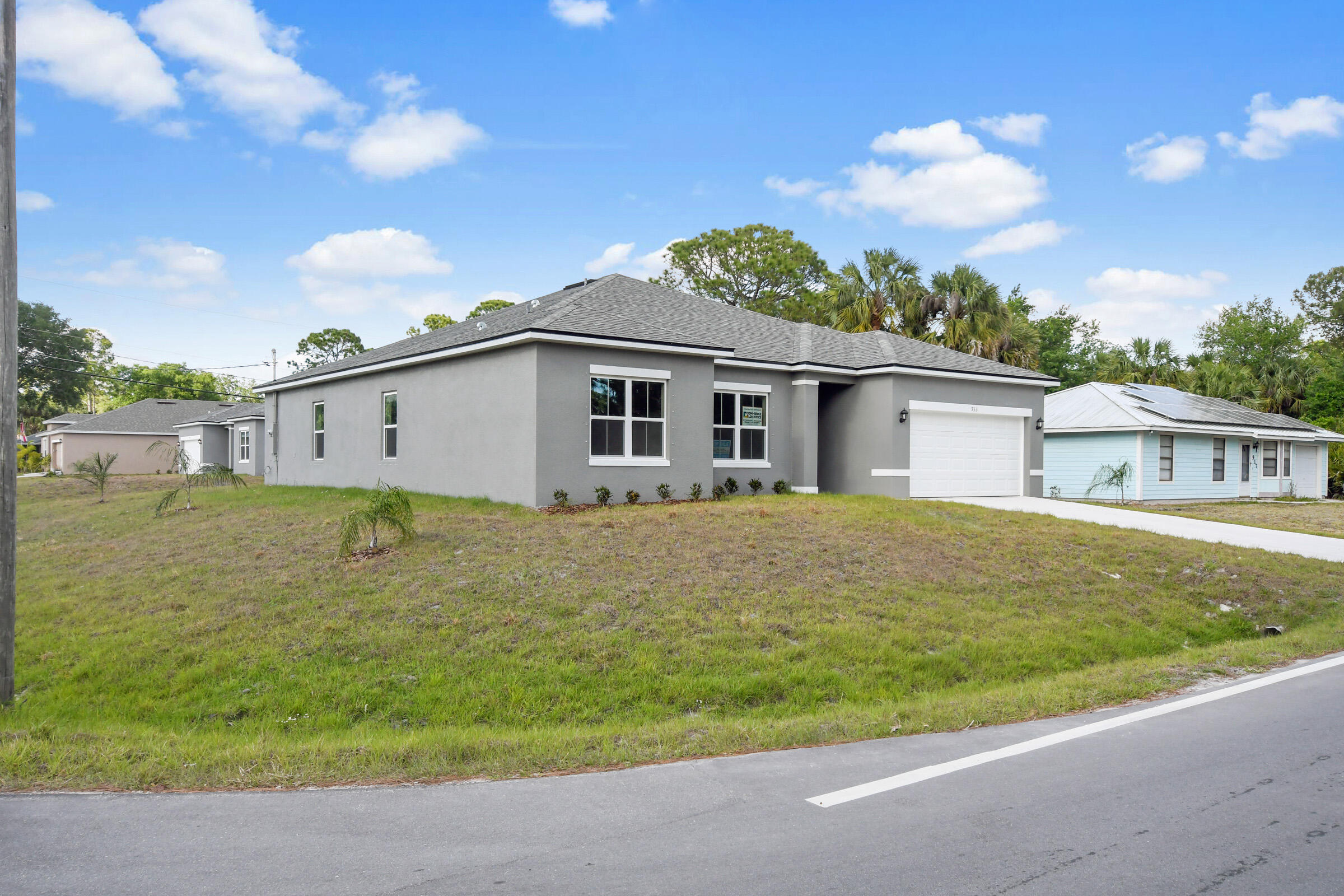933 Tupelo Road Southwest Palm Bay, FL 32908 - Photo 29 of 31 a view of a house with a backyard