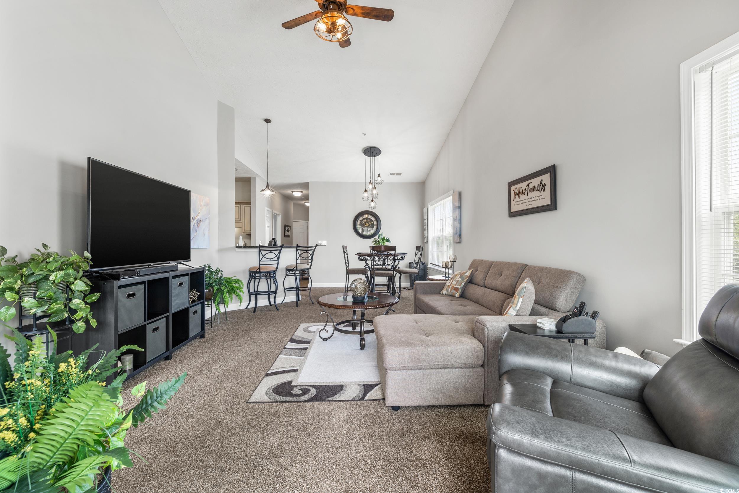213 Wando River Road, Unit E Myrtle Beach, SC 29579 - Photo 19 of 28 Dining room featuring carpet flooring