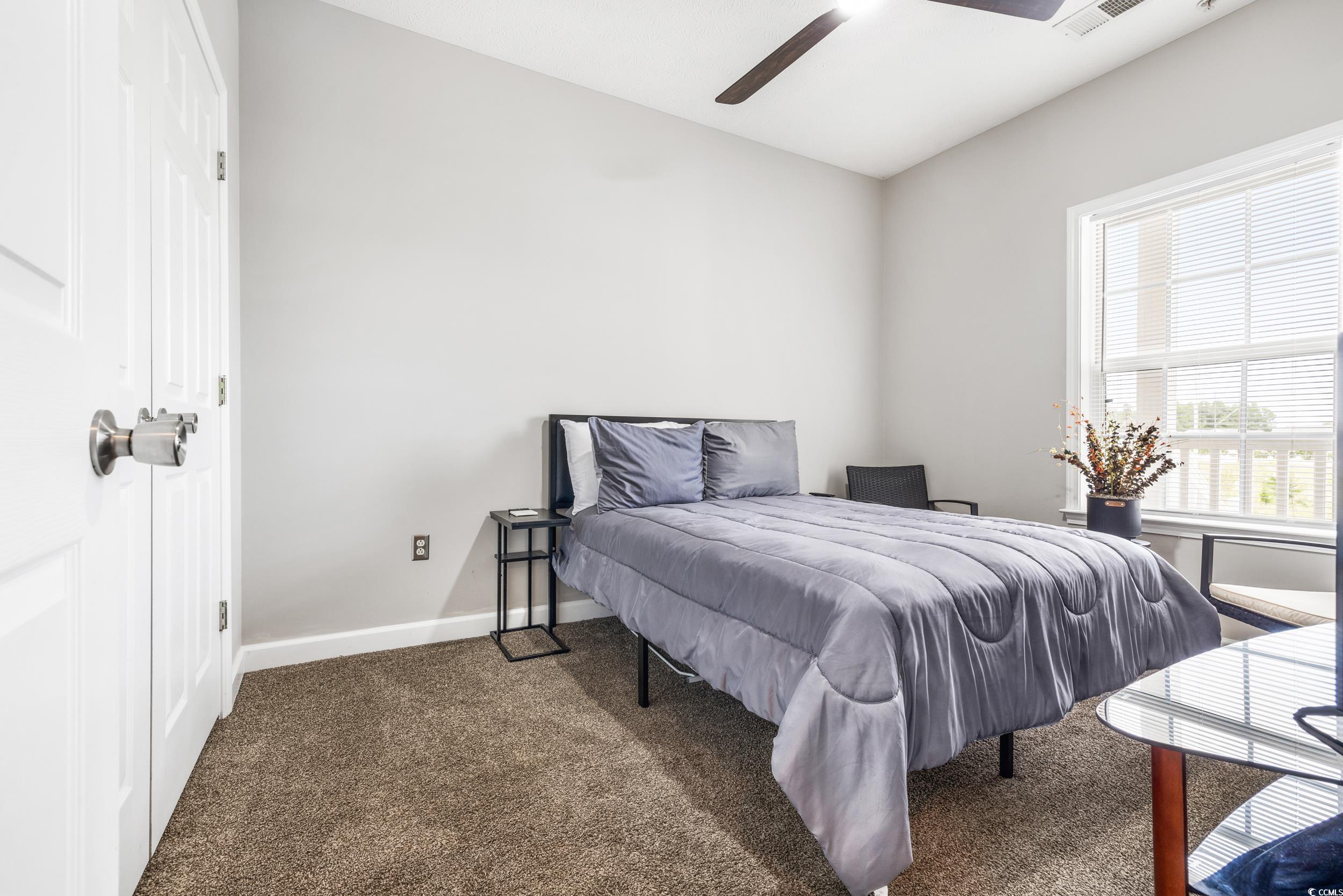 213 Wando River Road, Unit E Myrtle Beach, SC 29579 - Photo 10 of 28 Hall featuring dark colored carpet