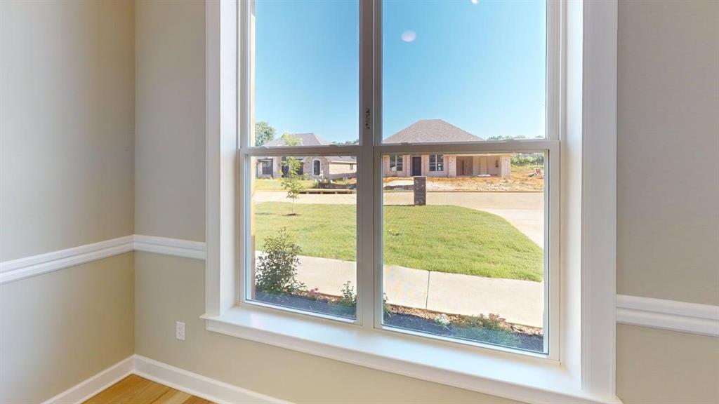 2510 Windmillln Windmill Lane Longview, TX 75601 - Photo 19 of 35 a view of a room that has a bed and a table
