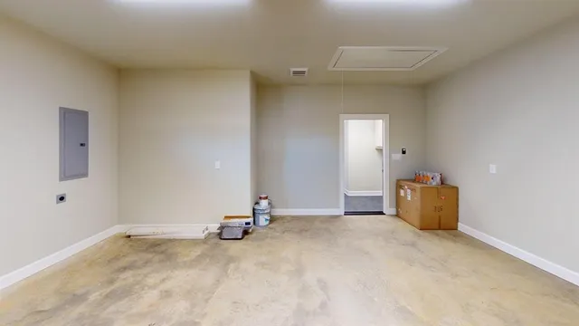 a large kitchen with stainless steel appliances kitchen island granite countertop a stove a refrigerator a sink dishwasher and a wooden cabinets with wooden floor