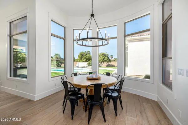 a spacious bedroom with a bed and a fireplace