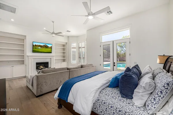 a bathroom with a sink toilet vanity and tub