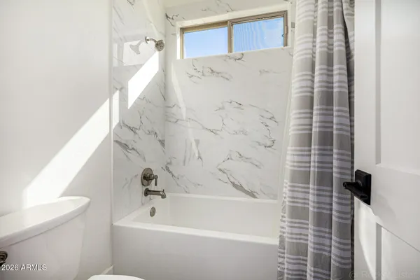 an aerial view of a house with a garden