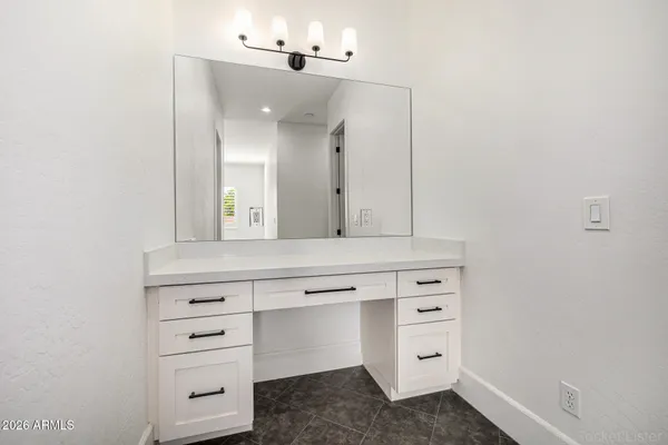 a front view of house with yard and outdoor seating