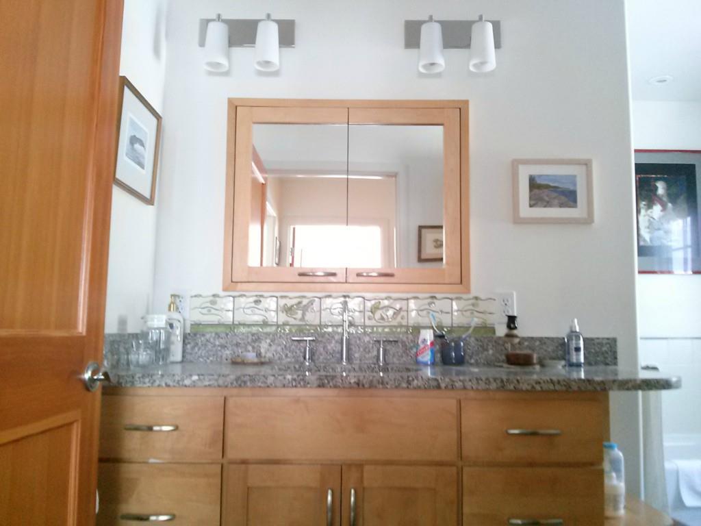 578 Newbury Neck Road Surry, ME 04684 - Photo 16 of 26 Master bathroom with granite counters.