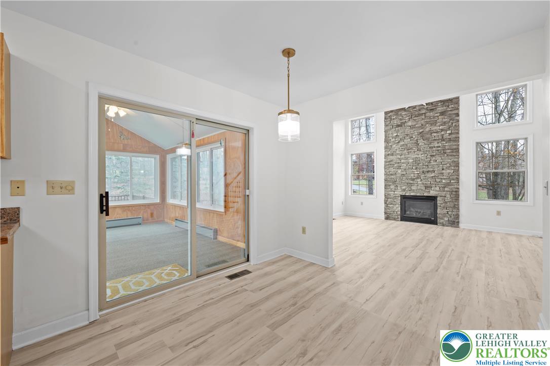 2 Pinewood Circle Hazleton, PA 18202 - Photo 12 of 34 a view of an empty room with glass door and windows