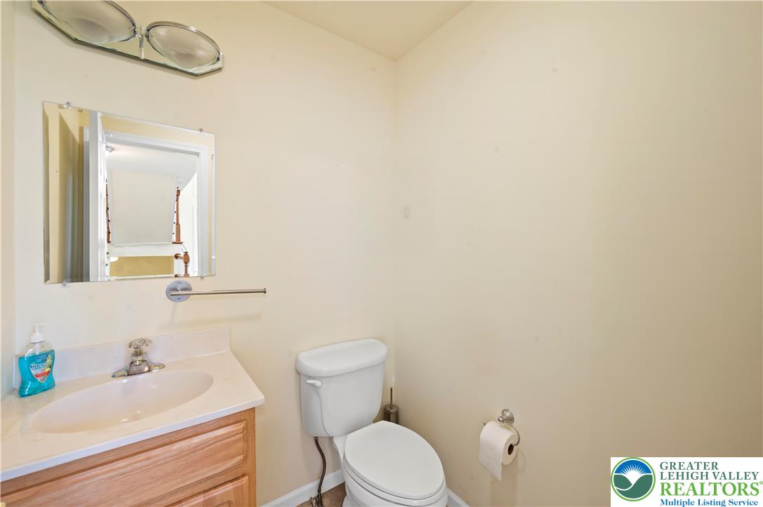 2 Pinewood Circle Hazleton, PA 18202 - Photo 18 of 34 a bathroom with a sink a toilet and mirror