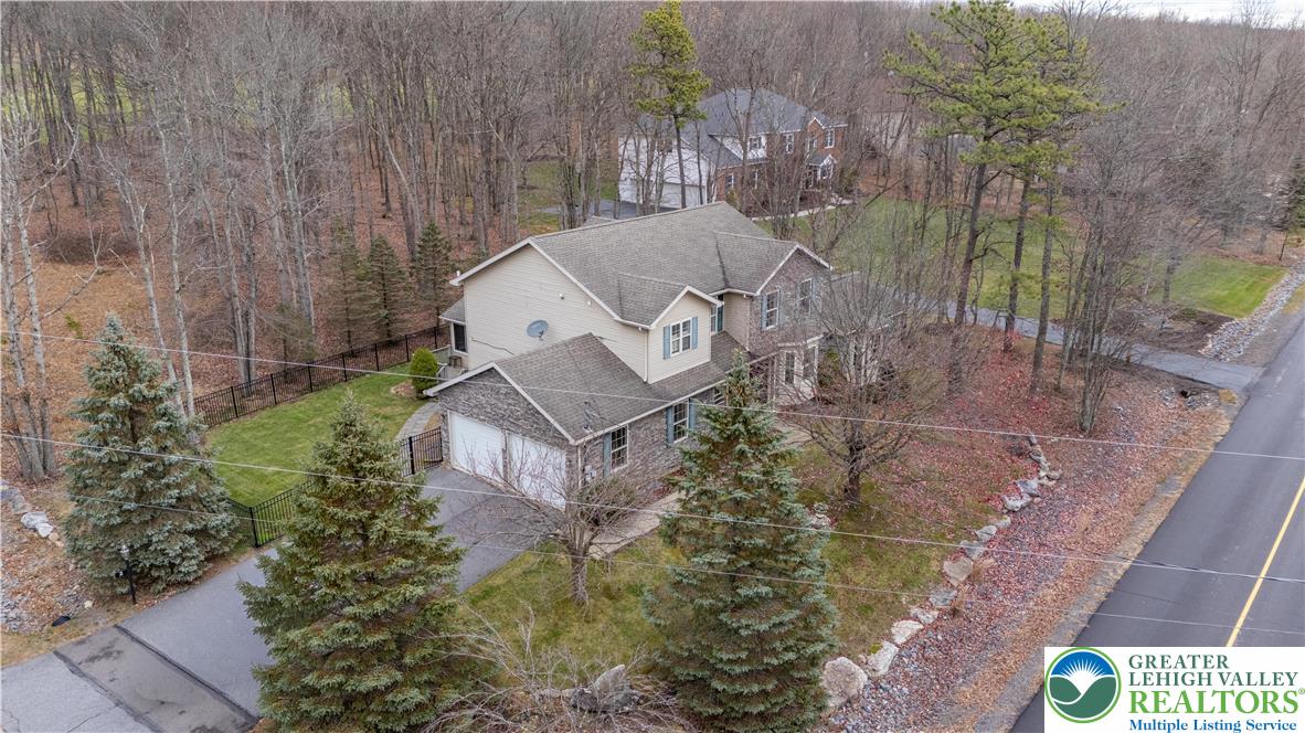 2 Pinewood Circle Hazleton, PA 18202 - Photo 2 of 34 an aerial view of a house with a yard