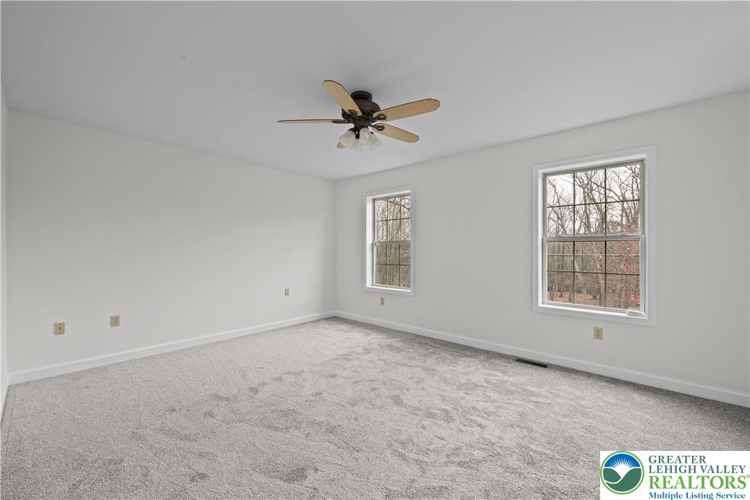2 Pinewood Circle Hazleton, PA 18202 - Photo 22 of 34 an empty room with windows and fan