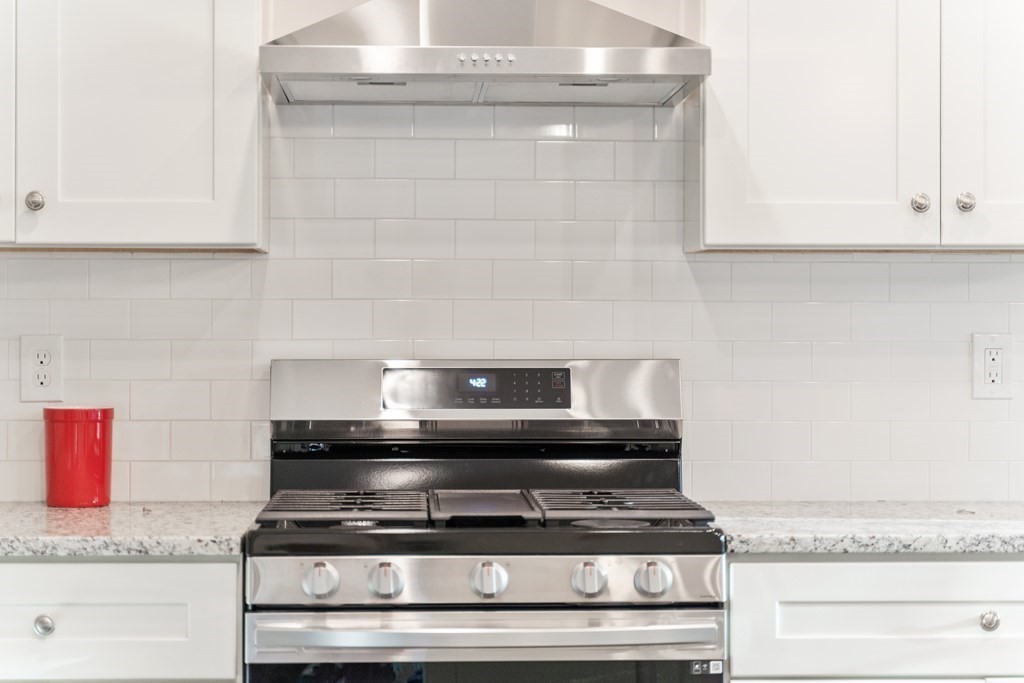 245 Glendale Road Northampton, MA 01062 - Photo 15 of 36 a stove top oven sitting inside of a kitchen