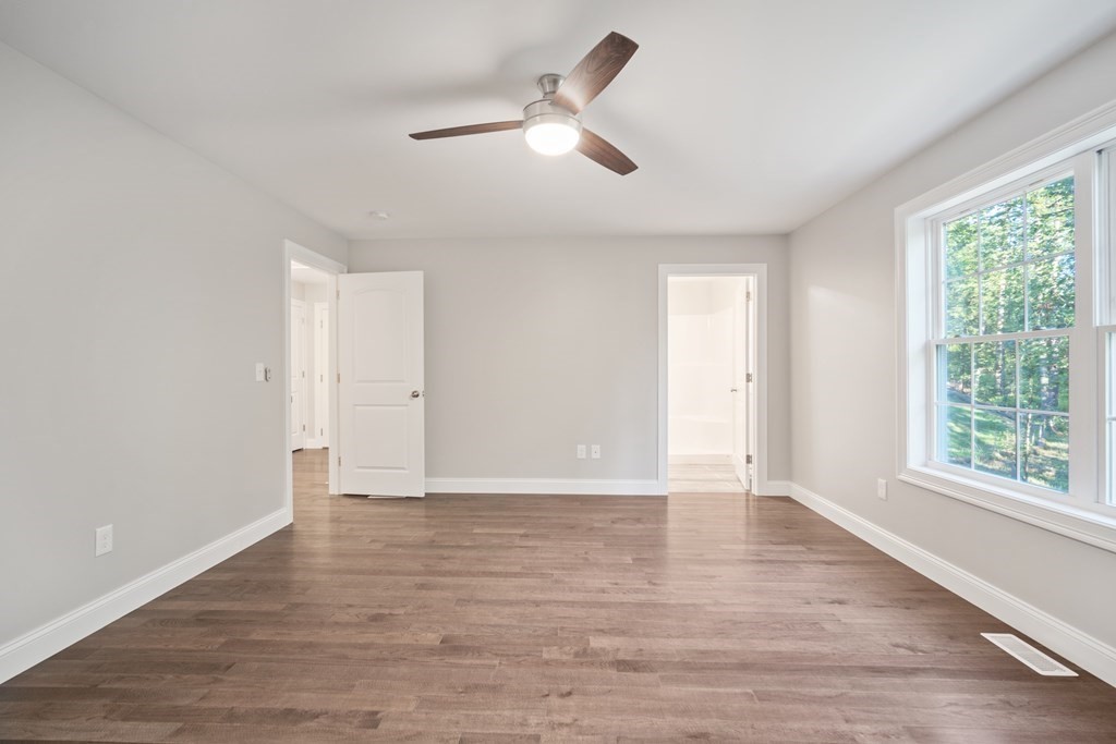 245 Glendale Road Northampton, MA 01062 - Photo 20 of 36 wooden floor in an empty room with a window