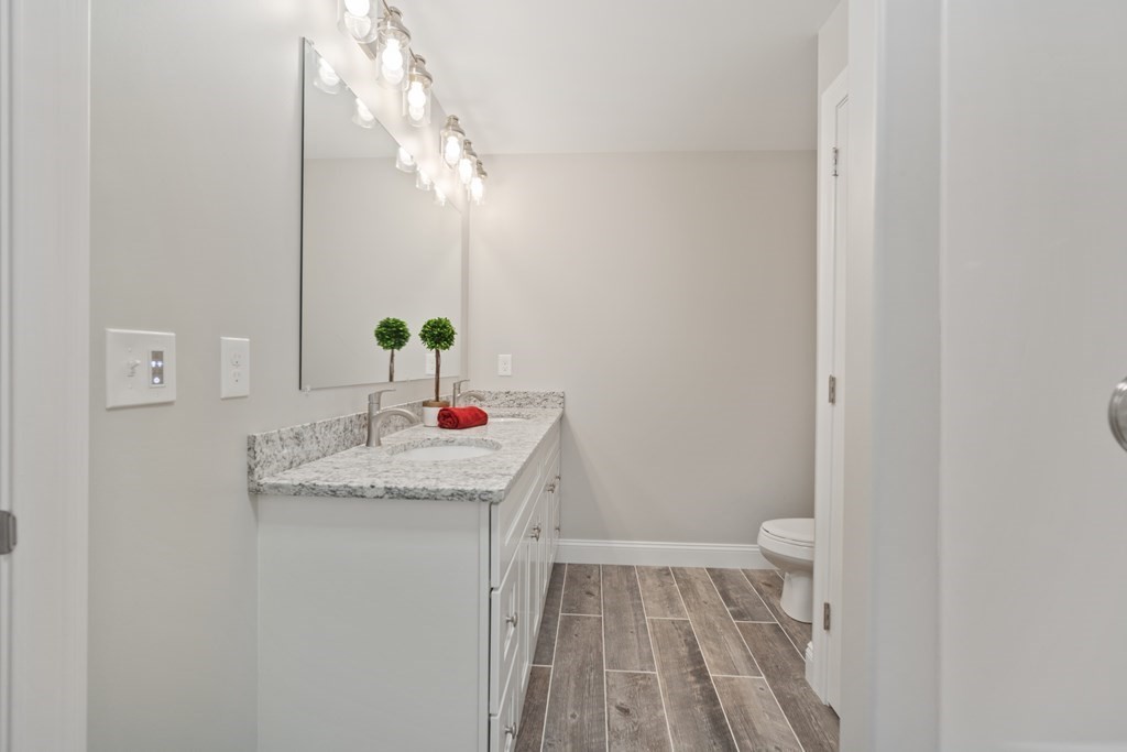 245 Glendale Road Northampton, MA 01062 - Photo 22 of 36 a bathroom with a sink and a mirror
