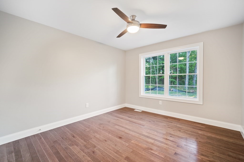 245 Glendale Road Northampton, MA 01062 - Photo 29 of 36 an empty room with wooden floor and windows
