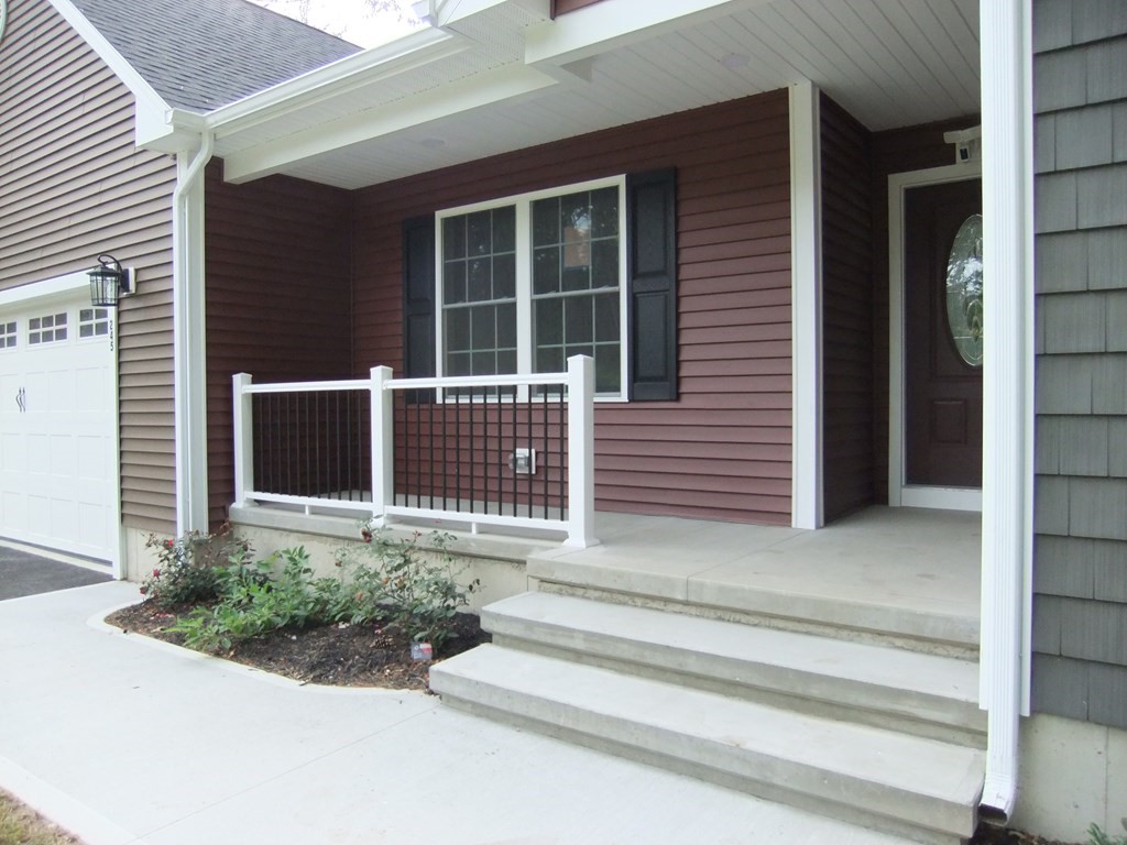 245 Glendale Road Northampton, MA 01062 - Photo 3 of 36 a small garden in front of a house