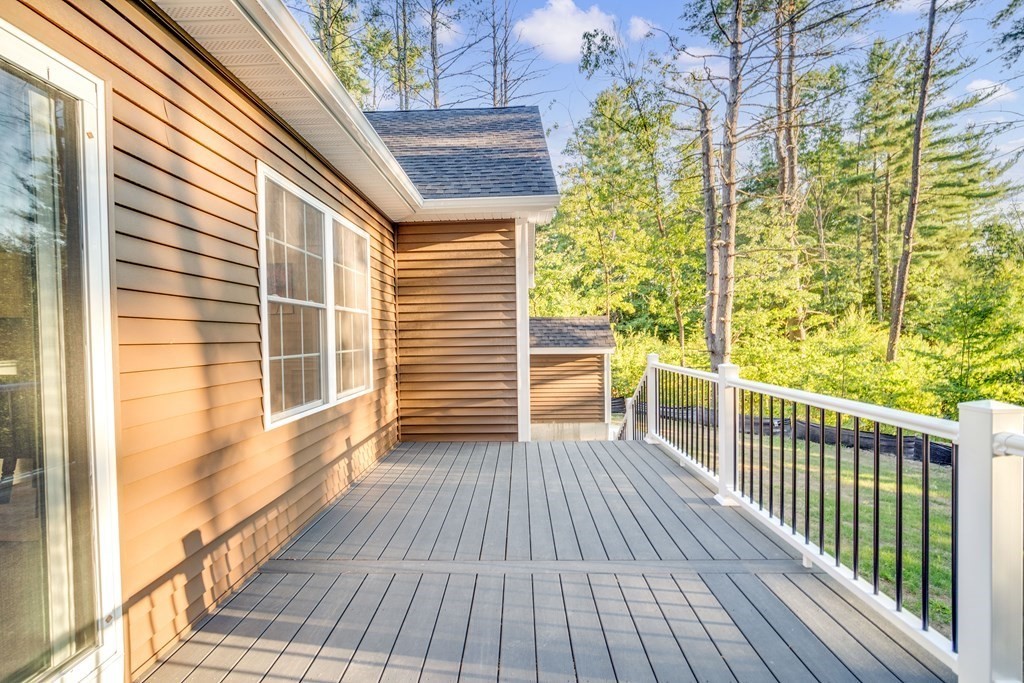 245 Glendale Road Northampton, MA 01062 - Photo 33 of 36 a view of a balcony with wooden floor and fence