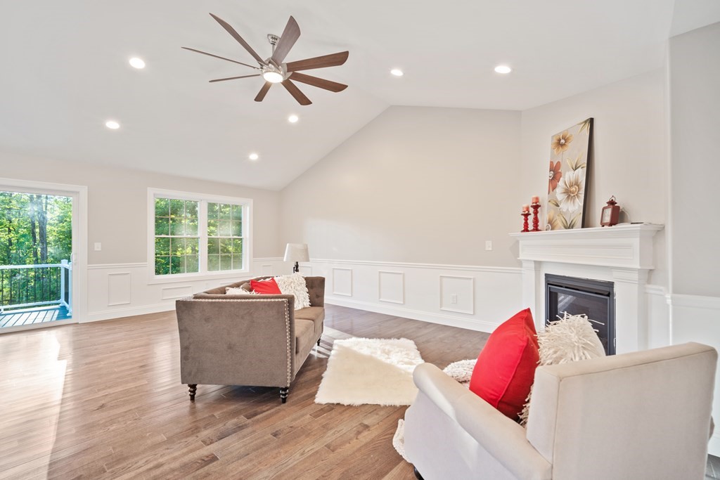 245 Glendale Road Northampton, MA 01062 - Photo 5 of 36 a living room with furniture and a fireplace