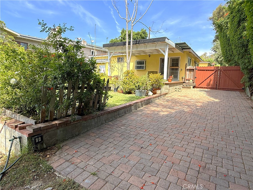 6652 Valmont Street Tujunga, CA 91042 - Photo 1 of 16 a front view of a house with a yard