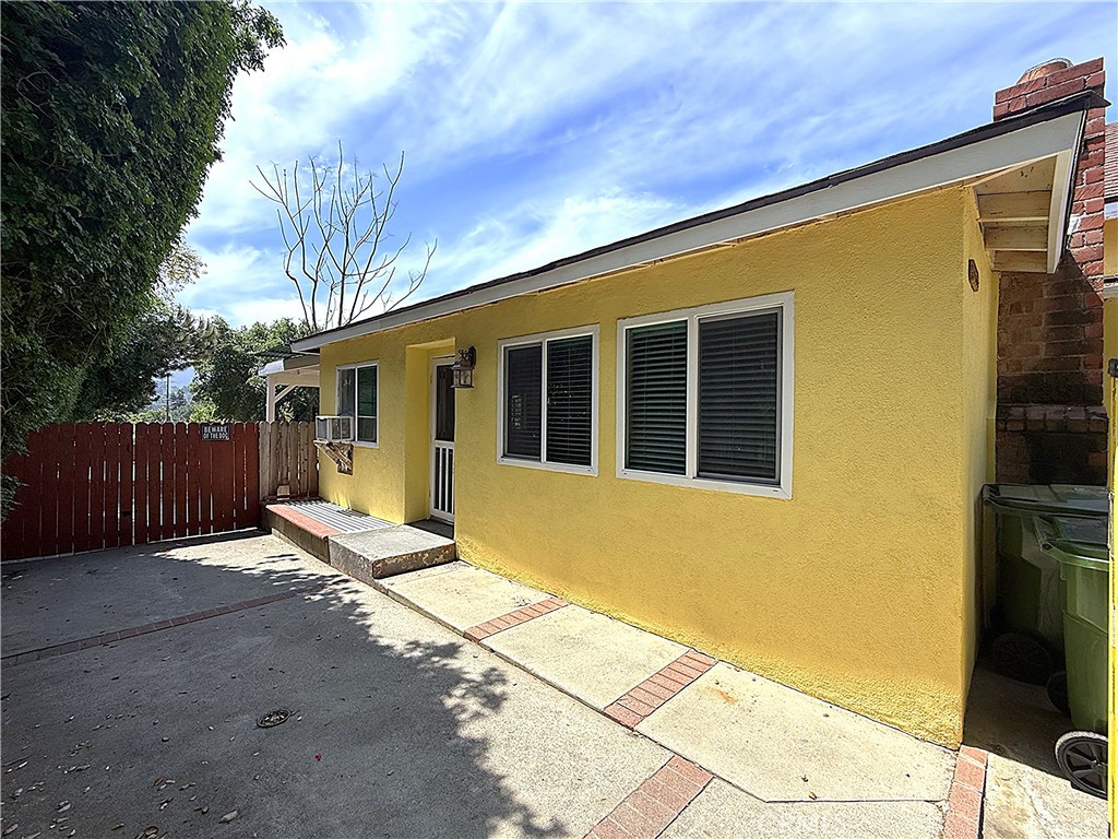 6652 Valmont Street Tujunga, CA 91042 - Photo 15 of 16 a view of a house with a backyard