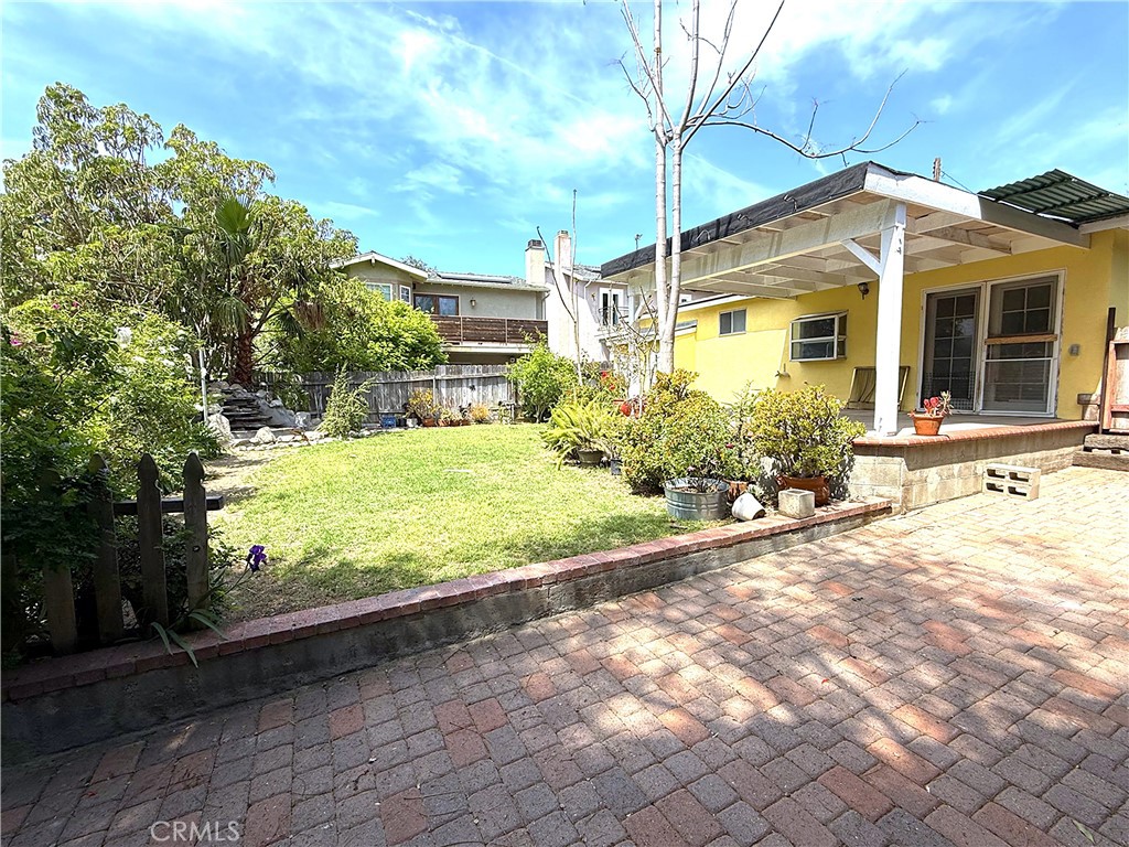 6652 Valmont Street Tujunga, CA 91042 - Photo 16 of 16 a front view of a house with garden