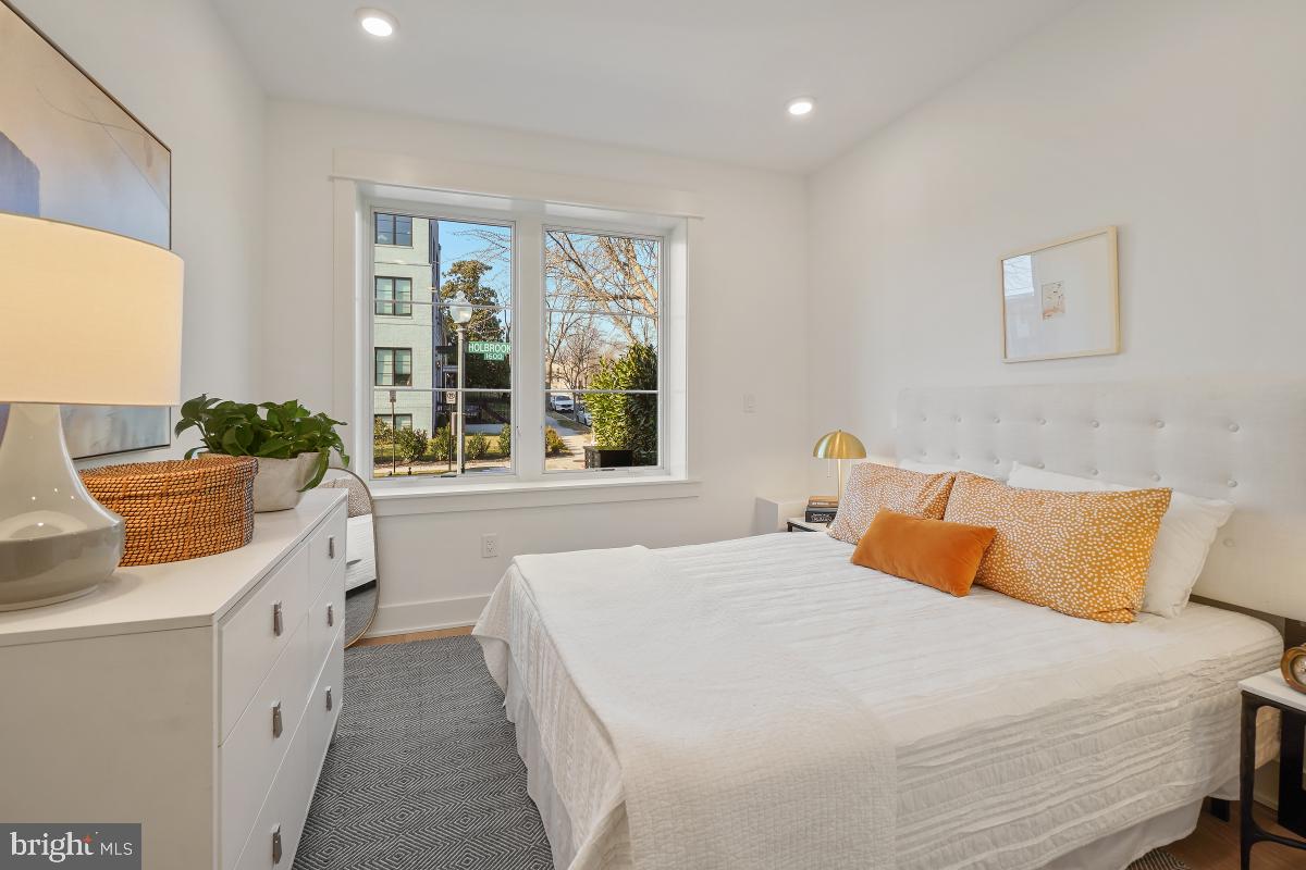 1605 Holbrook Street Northeast, Unit 1 Washington, DC 20002 - Photo 11 of 25 a bedroom with a bed and a large window
