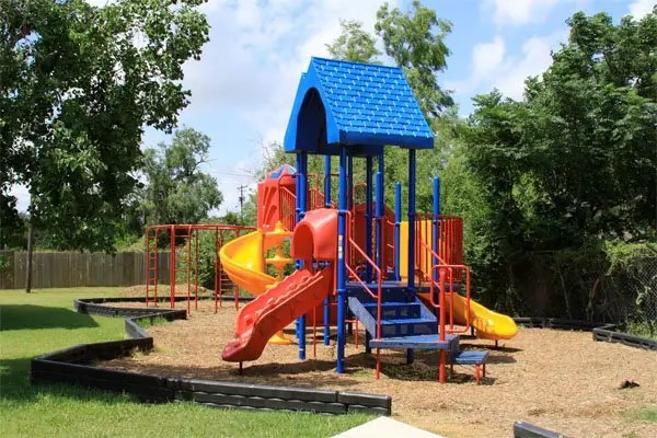 601 South 17th Street Harlingen, TX 78550 - Photo 11 of 11 a view of playground with a slide