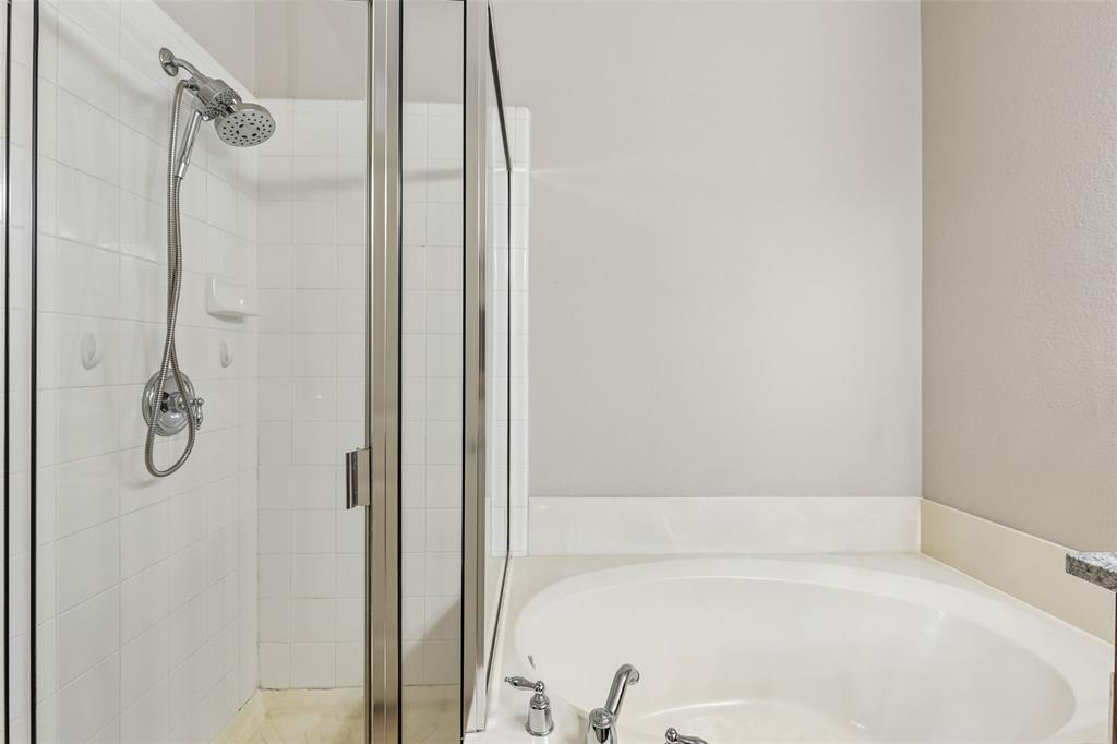 5500 Conch Train Road McKinney, TX 75070 - Photo 25 of 34 a bathroom with a bathtub