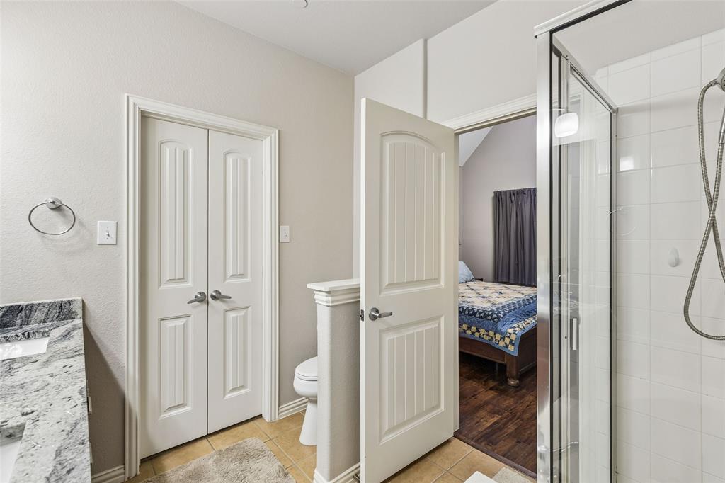 5500 Conch Train Road McKinney, TX 75070 - Photo 26 of 34 a view of a bedroom with bathroom