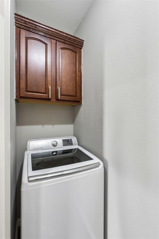 5500 Conch Train Road McKinney, TX 75070 - Photo 27 of 34 a utility room with dryer and washer