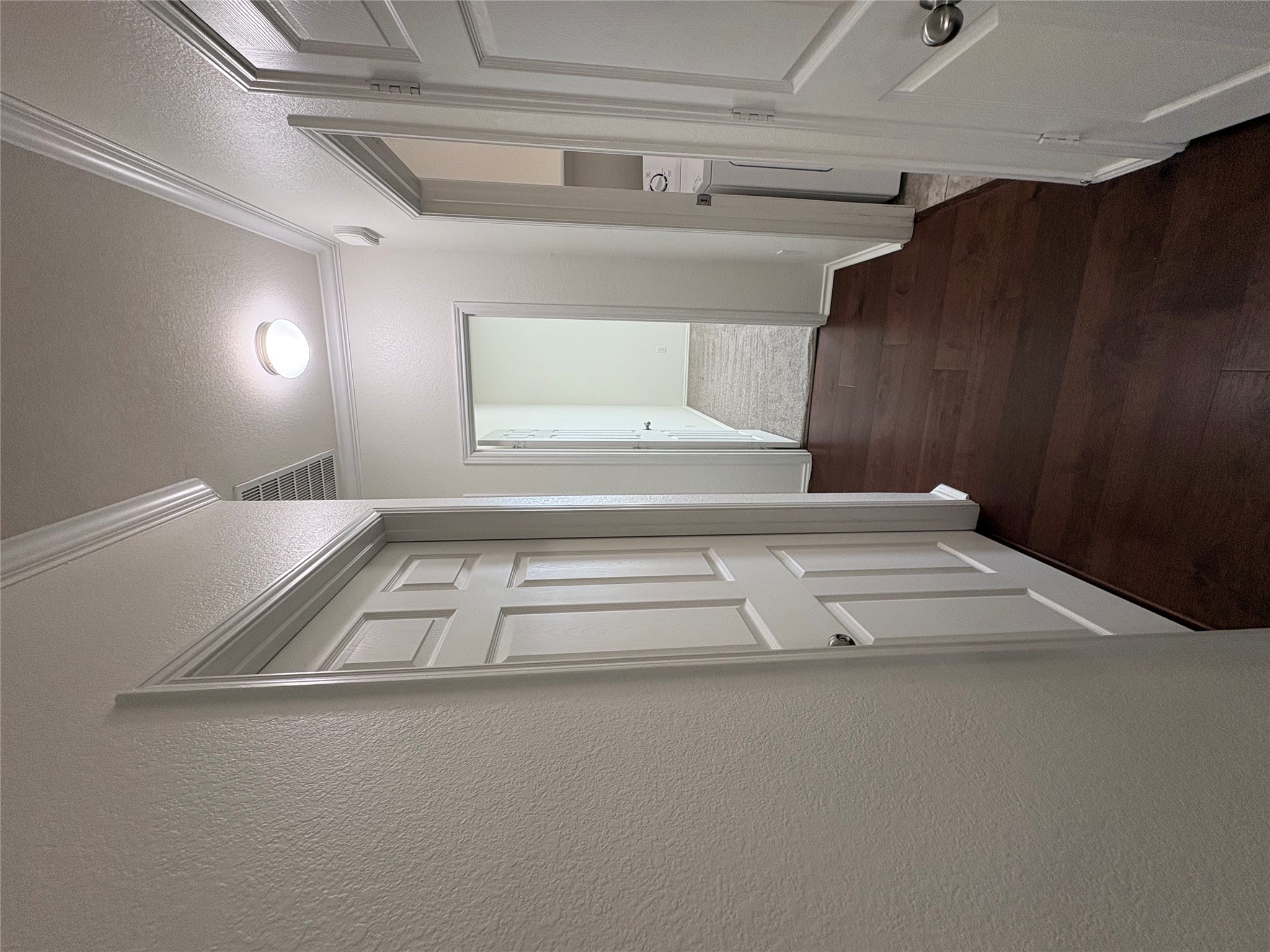 11617 Murron Drive Austin, TX 78754 - Photo 19 of 30 a view of a hallway with wooden floor