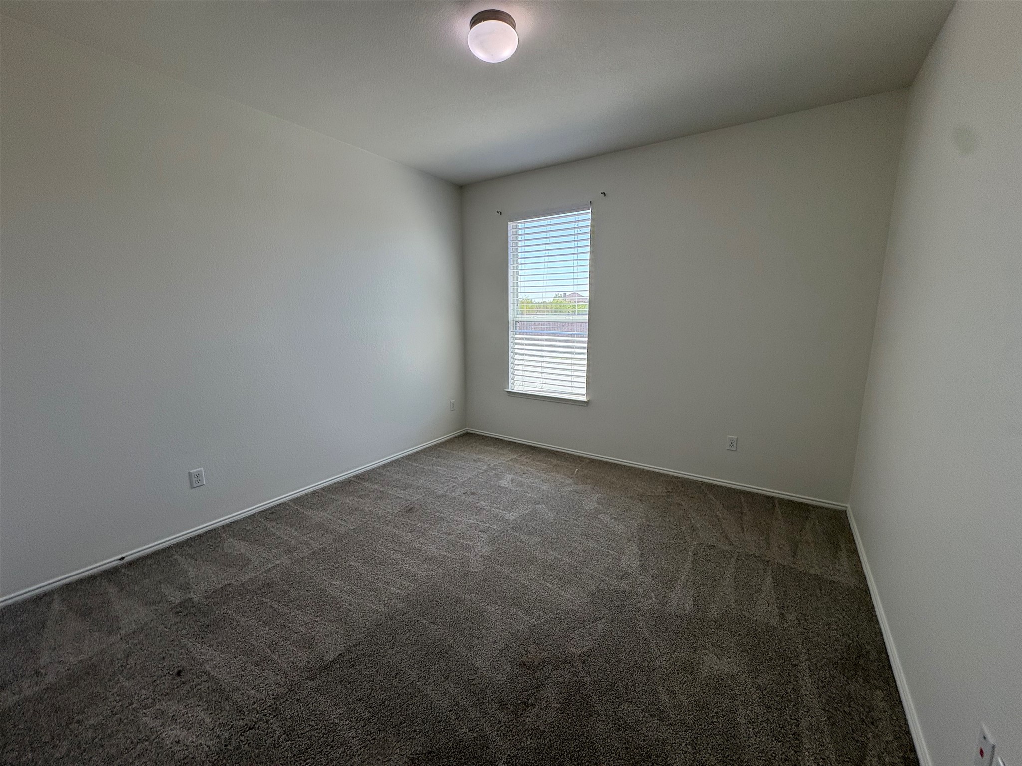 11617 Murron Drive Austin, TX 78754 - Photo 20 of 30 an empty room with windows