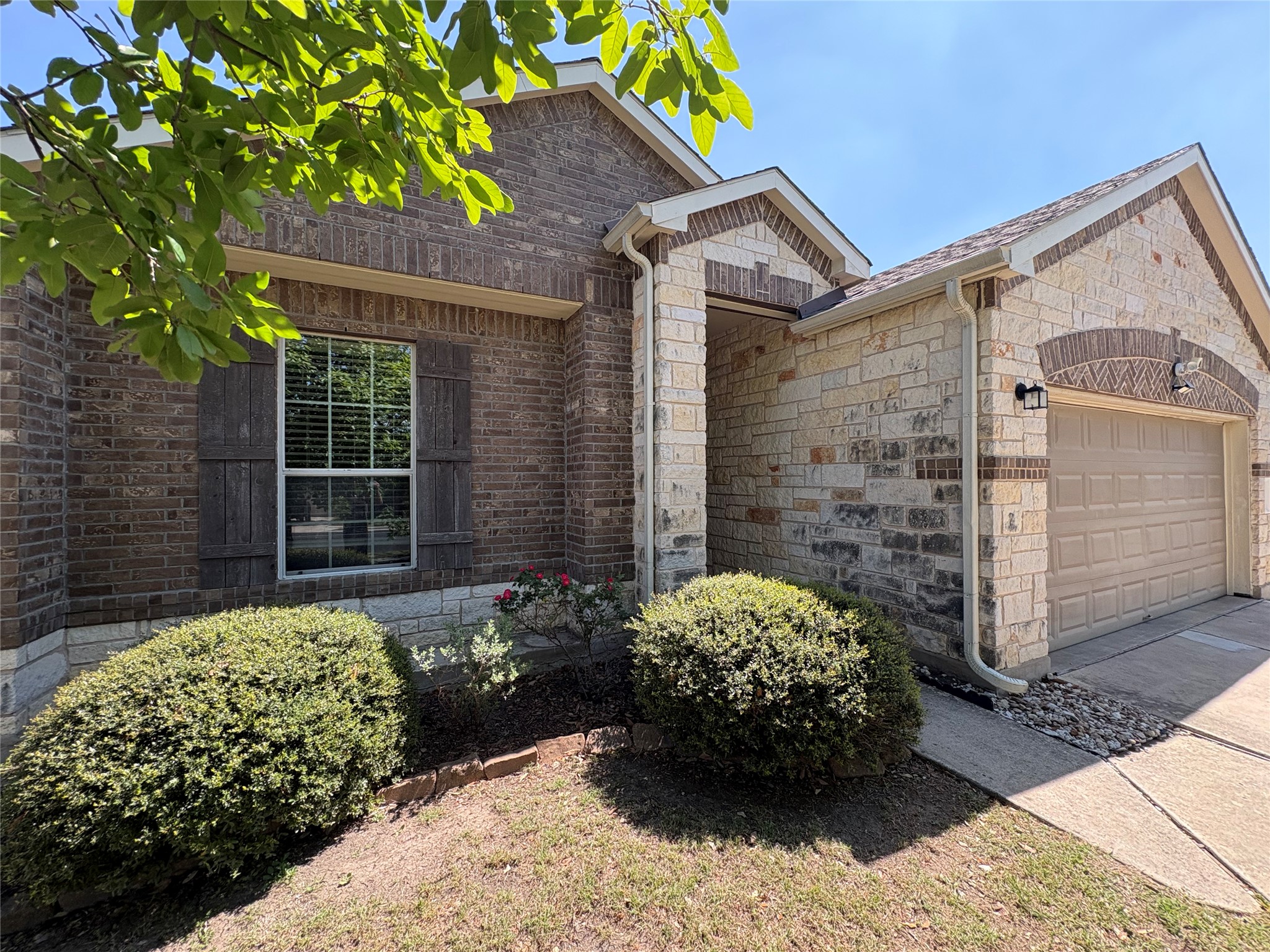 11617 Murron Drive Austin, TX 78754 - Photo 2 of 30 a view of a pathway that has potted plants