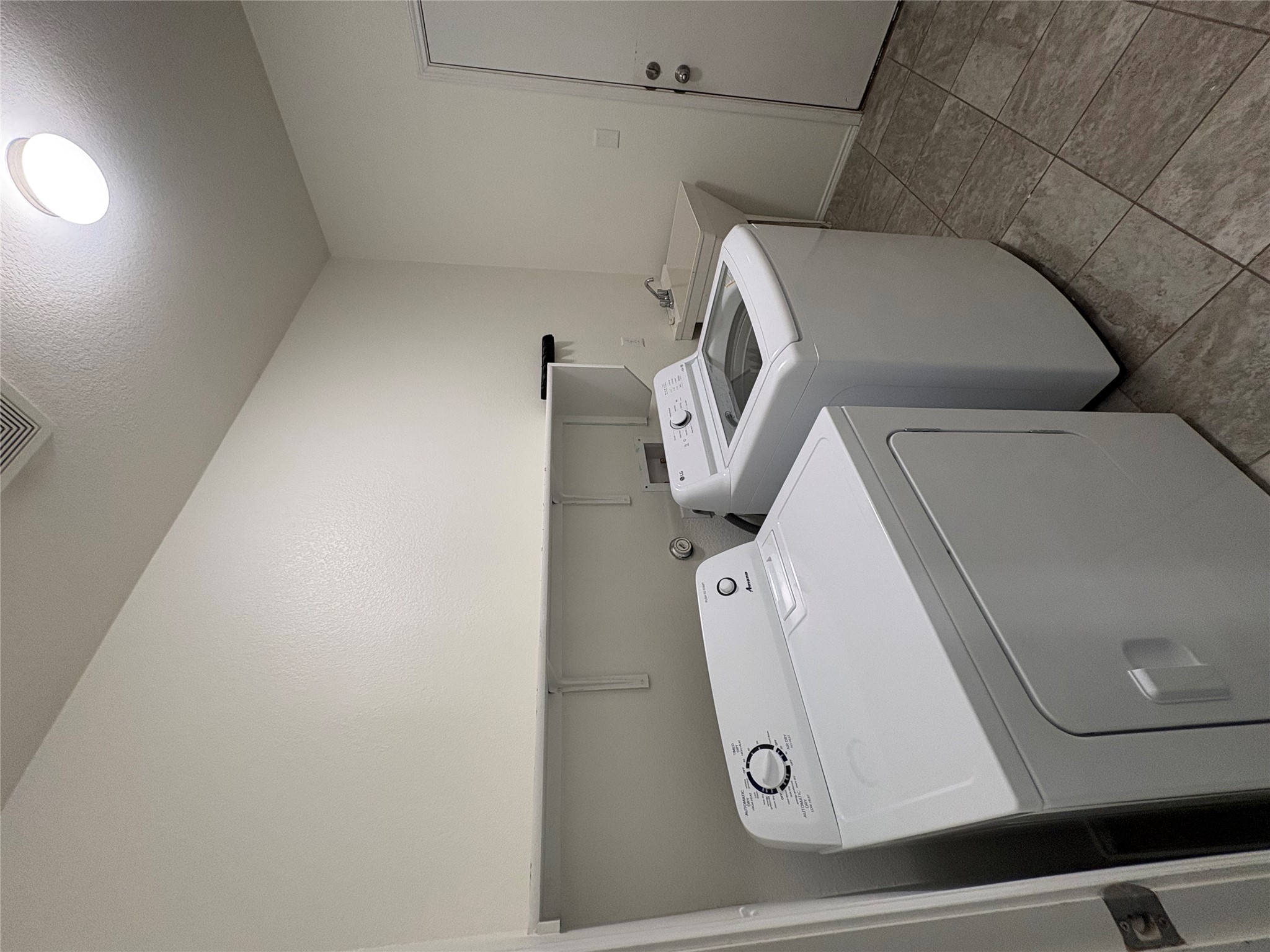 11617 Murron Drive Austin, TX 78754 - Photo 25 of 30 a utility room with dryer and washer