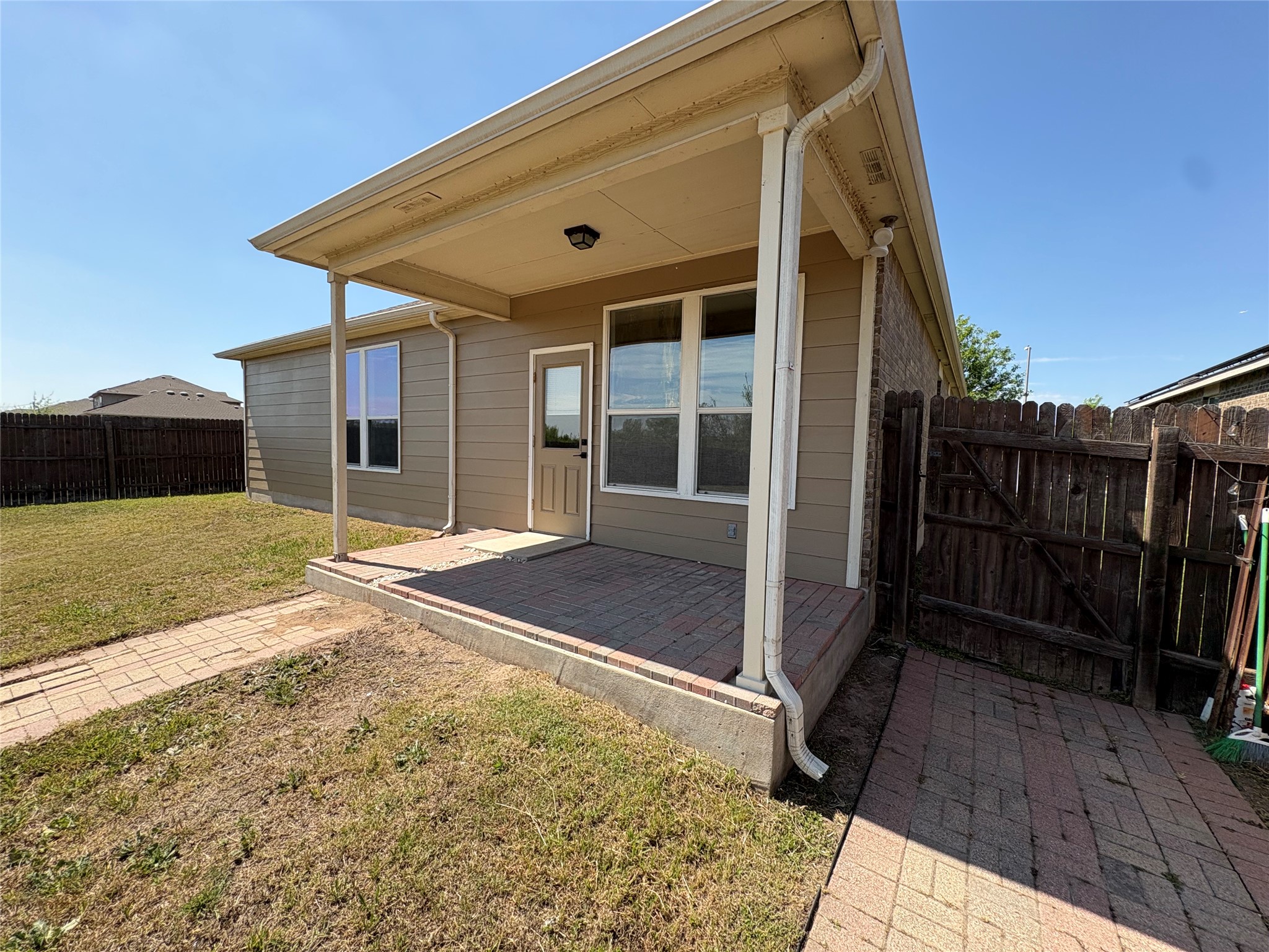 11617 Murron Drive Austin, TX 78754 - Photo 26 of 30 a view of a house with backyard and porch