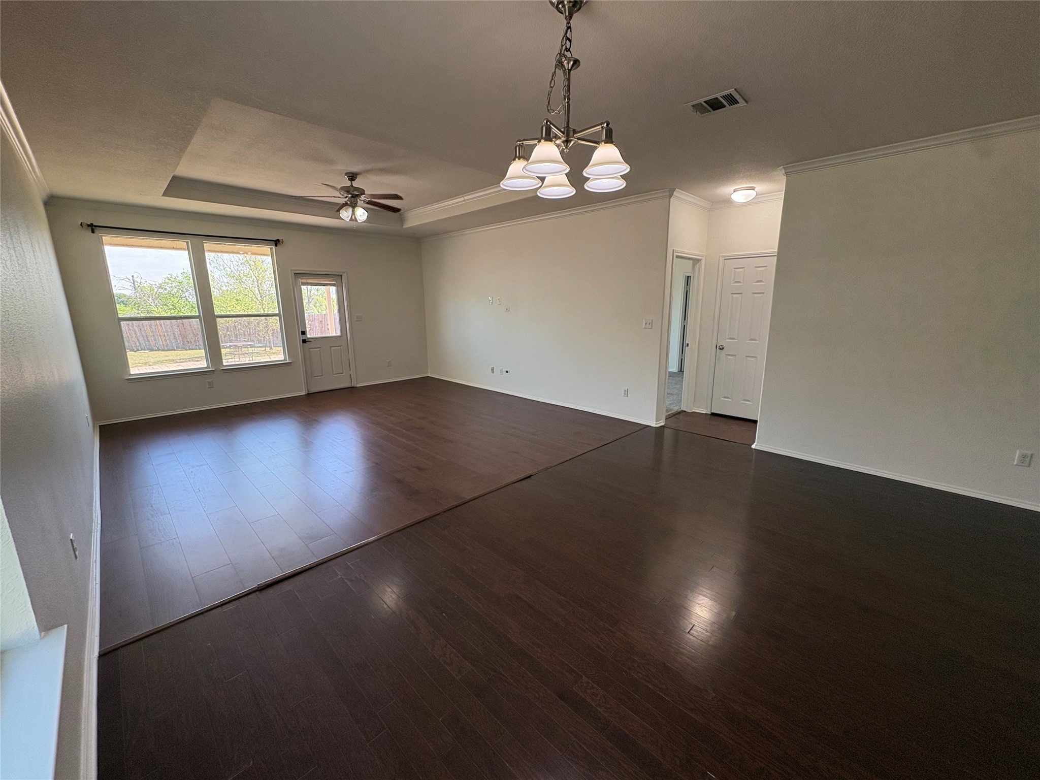 11617 Murron Drive Austin, TX 78754 - Photo 10 of 30 wooden floor in an empty room with a window