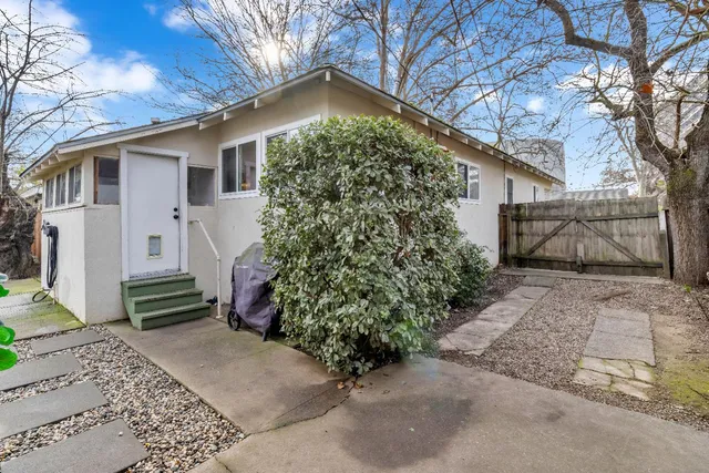a view of a backyard with plants
