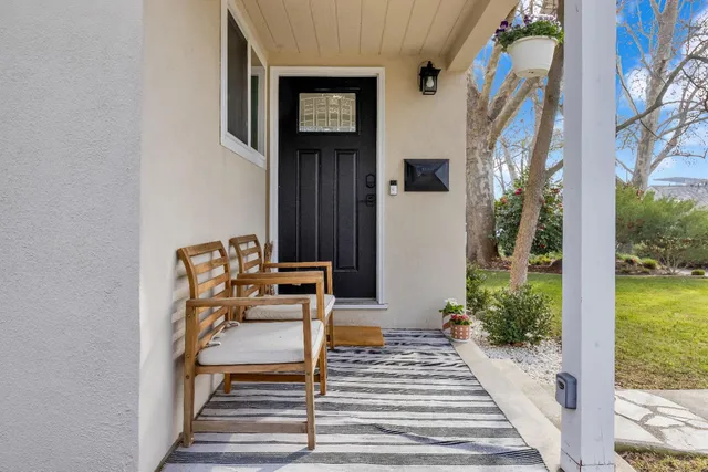 a view of balcony with furniture