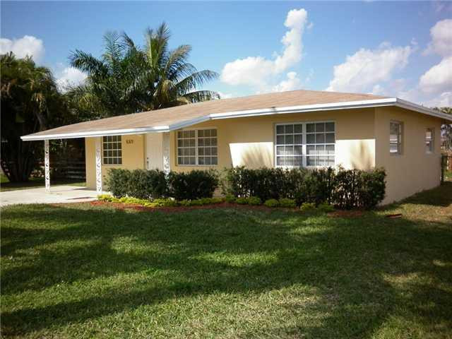 5371 Madison Road Delray Beach, FL 33484 - Photo 1 of 14 Exterior Front