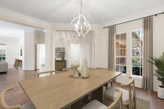 a view of a room with wooden floor