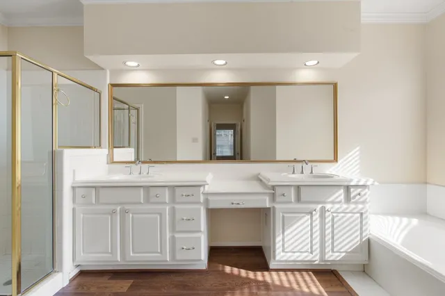 front view of a house with a tree