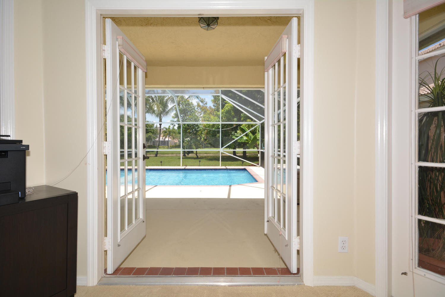 18702 Cape Sable Drive Boca Raton, FL 33498 - Photo 26 of 53 master french doors to pool